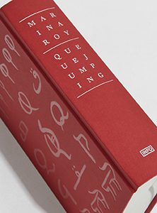 Spine of a book showing the title: Queuejumping